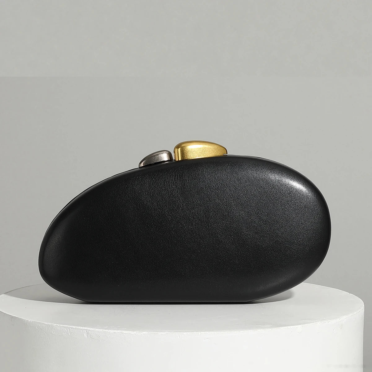 Sculpted Shell Clutch with Metallic Chain
