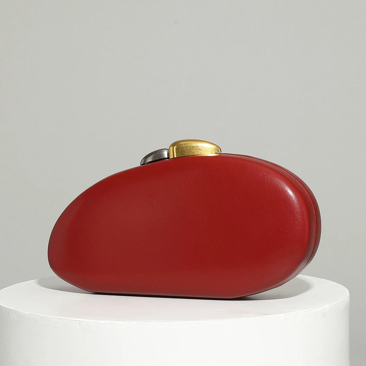 Sculpted Shell Clutch with Metallic Chain